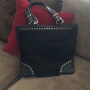 Leather and calf hair handbag